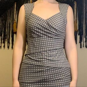 White House Black Market sleeveless blouse. Size M.